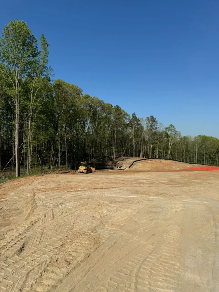 Bulldozer working on forest land clearing site